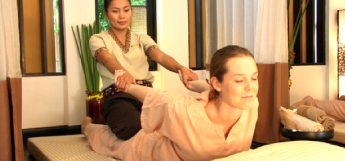 Thai assisted stretching example, photograph by Tara Angkor Hotel